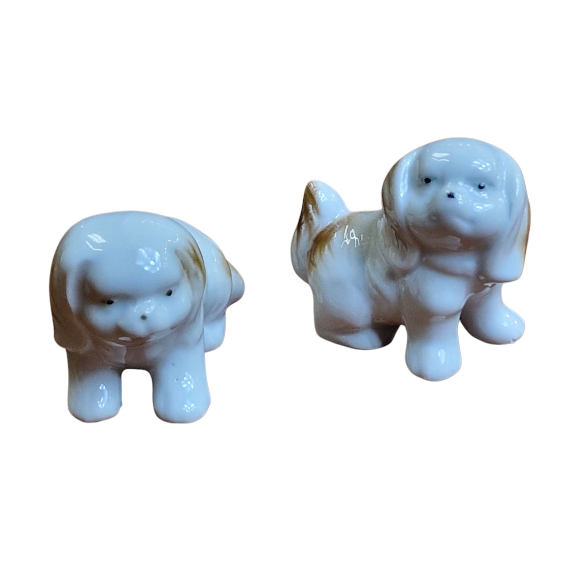 Par de miniaturas de cães em porcelana esmaltada