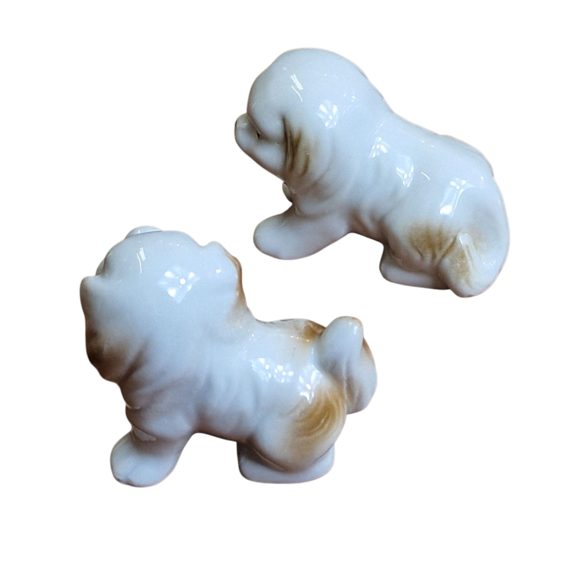 Par de miniaturas de cães em porcelana esmaltada