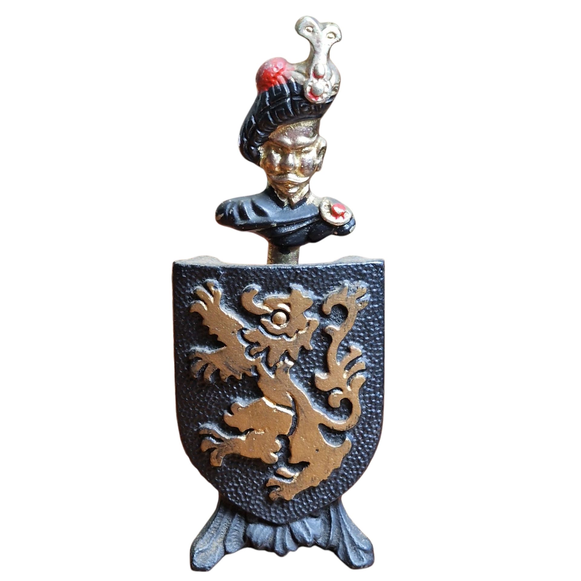 Abre-caricas com suporte heráldico em metal pintado